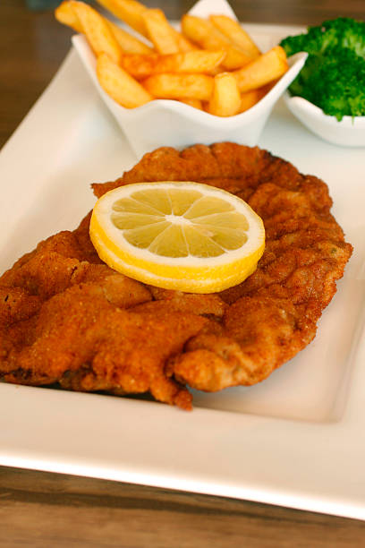 istock Meat: Schnitzel, French Fries and Salad 488028199
