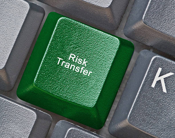 Keyboard with key for risk transfer stock photo