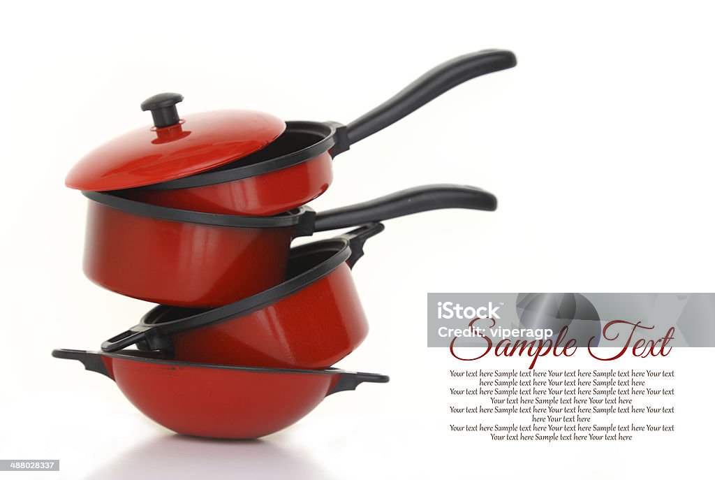 Red cookware set on white background Casserole Stock Photo