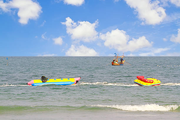 istock Banana boat in the sea 488033677