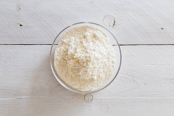 istock Flour in a bowl on wooden table 488047879