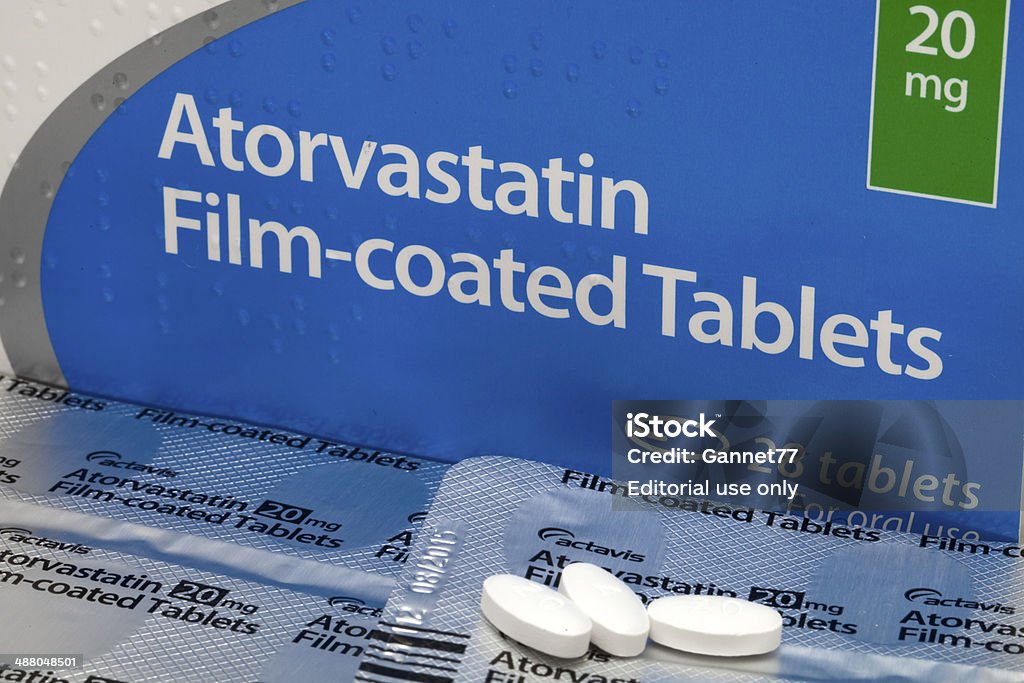 Atorvastatin Tablets Aberdeen, Scotland - April 7, 2014: A box of Atorvastatin tablets.  Atorvastatin is a member of the drug class known as statins, used for lowering blood cholesterol levels. Atorvastatin Stock Photo