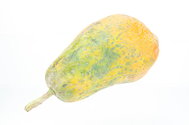 istock yellow papaya isolated on white with clipping path 488050405