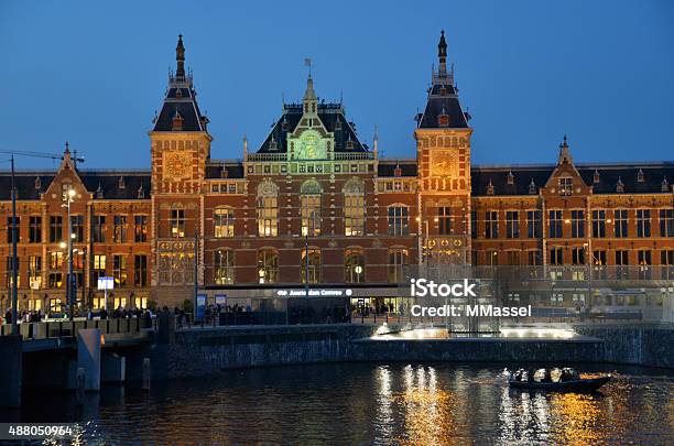 Amsterdam Central Station At Night Stock Photo - Download Image Now - Nautical Vessel, Night, Station