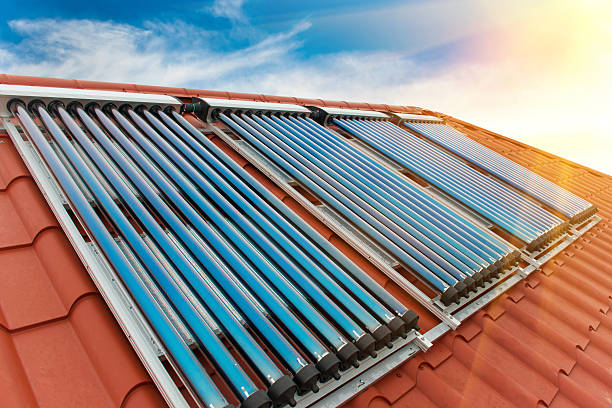 Vacuum collectors- solar water heating system stock photo