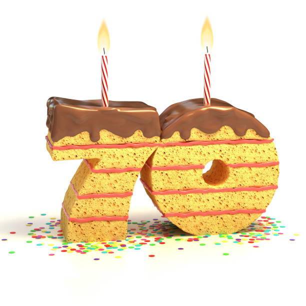 istock number 70 shaped chocolate birthday cake with lit candle 488051139