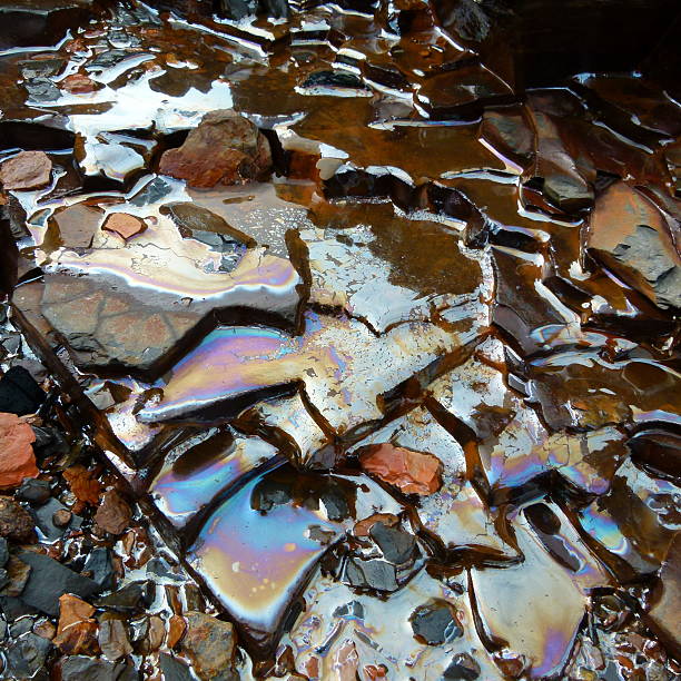 istock Oil in Water Lustre on Rocks 488053463