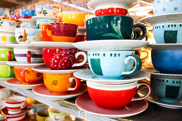 istock Stack of colorful teacups for sale in market 488053633