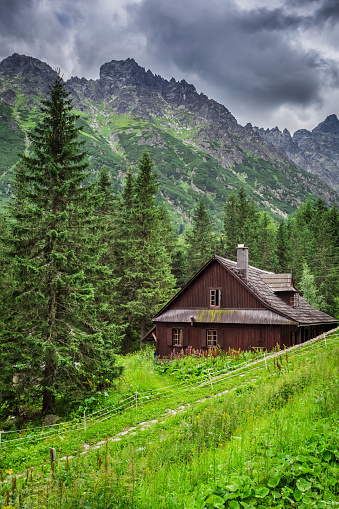 Small cottage in the middle of the mountains.