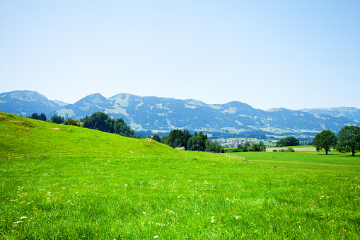 Summertime panorama of Allgäu around Schöllang in Bavaria. View to Fischen.