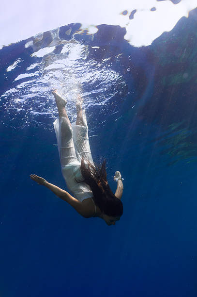 istock beautiful girl underwater 488057782