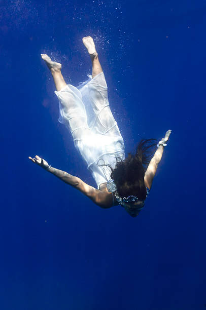 istock beautiful girl underwater 488058694