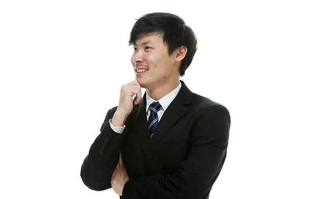 istock Smiling businessman looking away 488061142