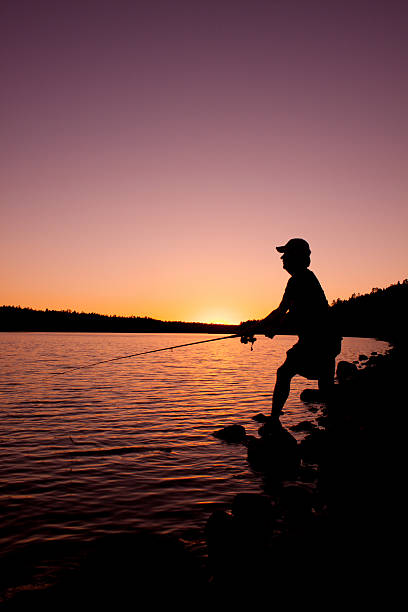 istock Lake Fishing at Sunset 488064308