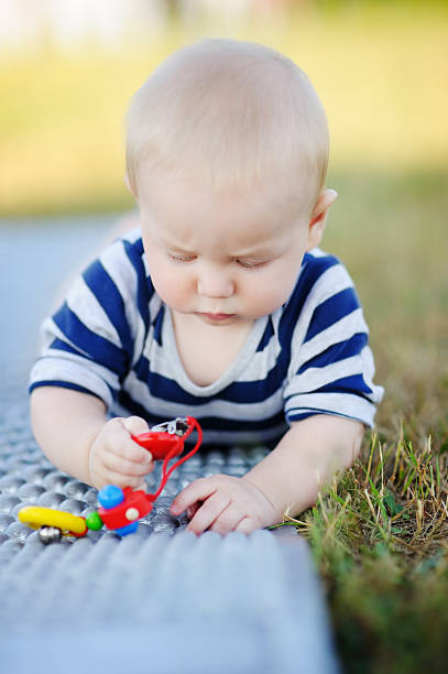 istock Baby play with bright toys 488064570