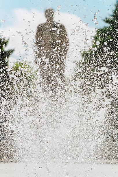 istock Silhouette of the monument through jet fountain 488065126