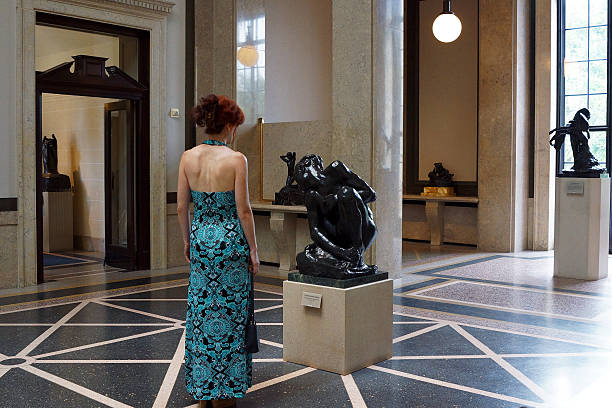 Woman in a Rodin Museum A woman looking at a sculpture at Rodin Museum @ Philadelphia, PA. benjamin franklin parkway photos stock pictures, royalty-free photos & images