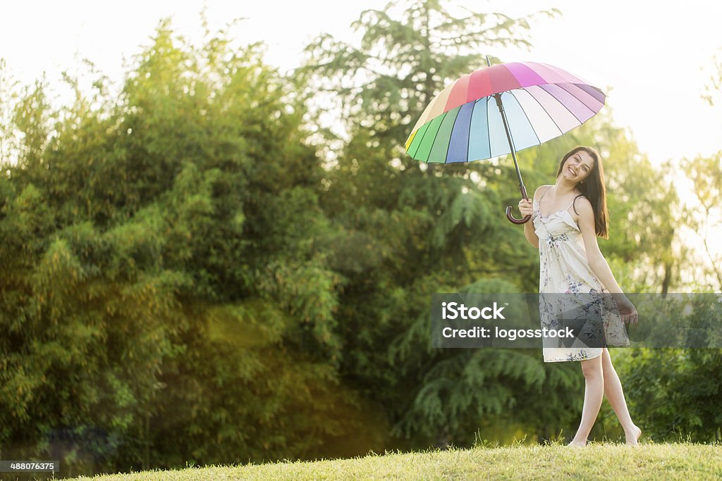 Woman with White Umbrella Standing in Field Admiration Stock Photo