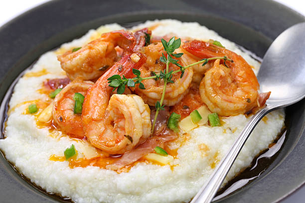 shrimp and grits shrimp and grits, cuisine of the southern united states cajun food photos stock pictures, royalty-free photos & images