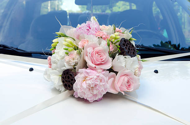 istock Wedding car decorated with flower bouquet 488080381