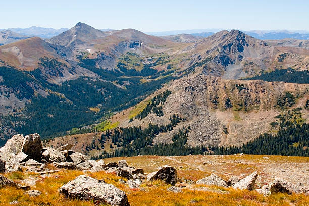 Hikers and Scenery on Mount Yale Colorado Trail through magnificent autumn scenery to 14,199 foot Mount Yale in the San Isabel National Forest near Cottonwood Pass Road near Buena Vista Colorado cottonwood pass stock pictures, royalty-free photos & images