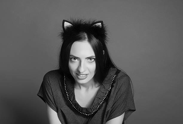 Beautiful and healthy girl model with long hair. Black and white photography. Bezel with ears