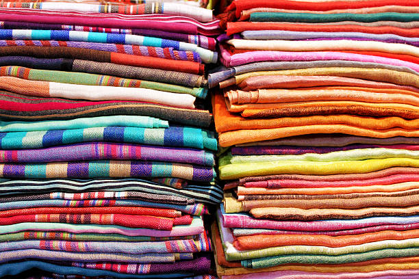 istock Abstract folded colorful fabrics and textile close up background 488081494