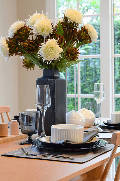 istock wooden table in dining room with elegant table setting 488081546