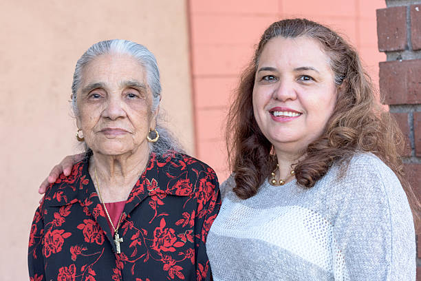istock Hispanic mother and daughter 488081930