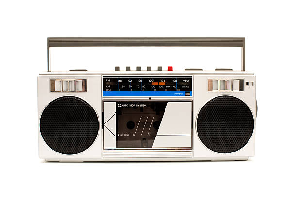 Portable, Silver Boom Box, With White Background Color image of a silver, personal stereo, with radio and tape player/recorder. On white background. vintage portable silver radio stock pictures, royalty-free photos & images