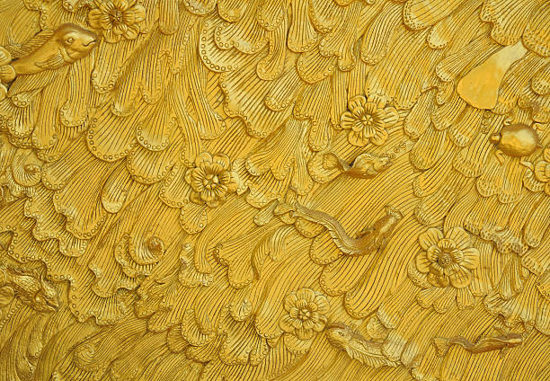 istock Gold stucco design of native thai style on the Wall 488082844
