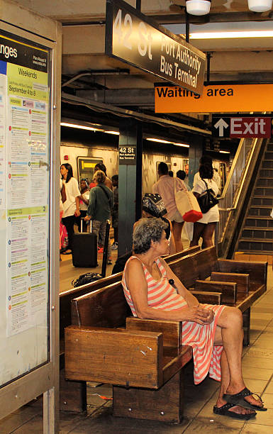 Homeless Woman on NYC Subway stock photo