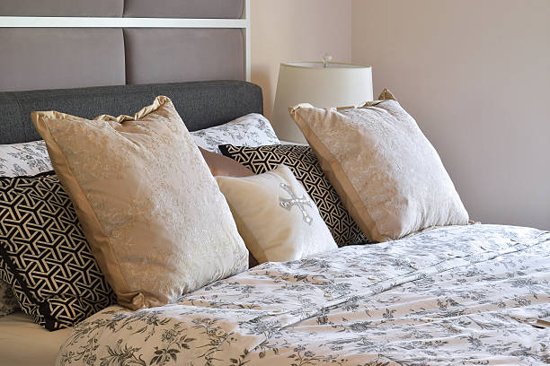 istock luxury bedroom interior with flower pattern pillows and decorati 488084164