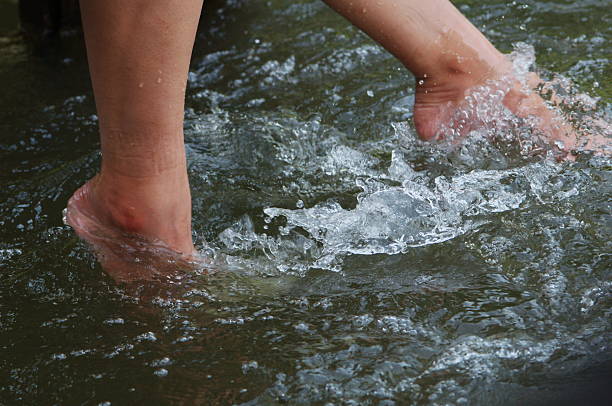 istock relaxing feet in the fresh water 488087584