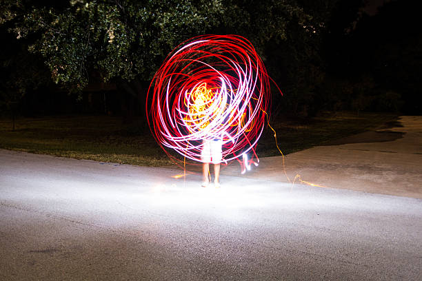 istock Dropping Orange and red Light Painting 488094476
