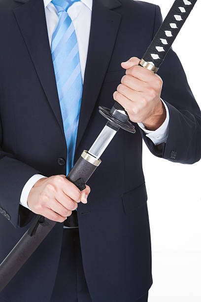 istock Close-up Of Businessman With Sword 488097101