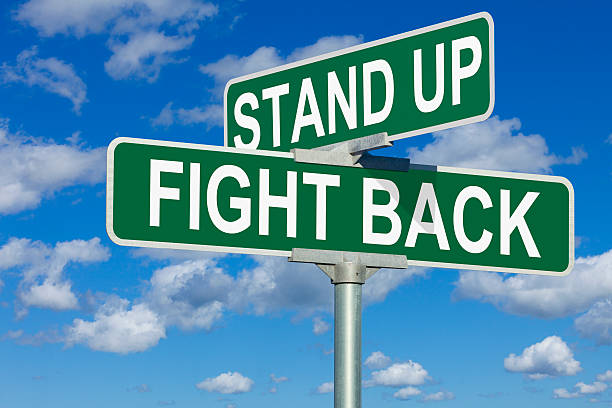 istock Stand Up, Fight Back Street Sign 488097503