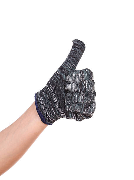 istock thumb up hand in glove isolated on white 488100363
