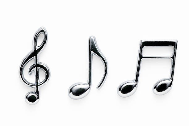 Silver metal musical note isolated on white background with clipping path.