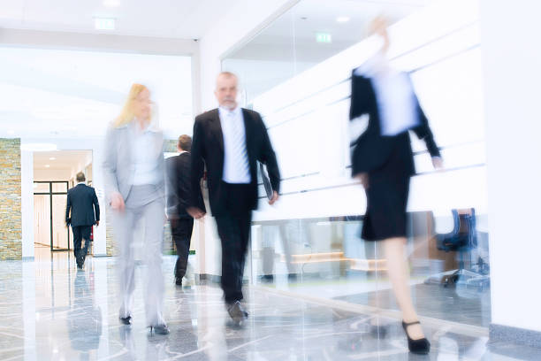 istock Businesspeople Walking in a Modern Interior 488104241