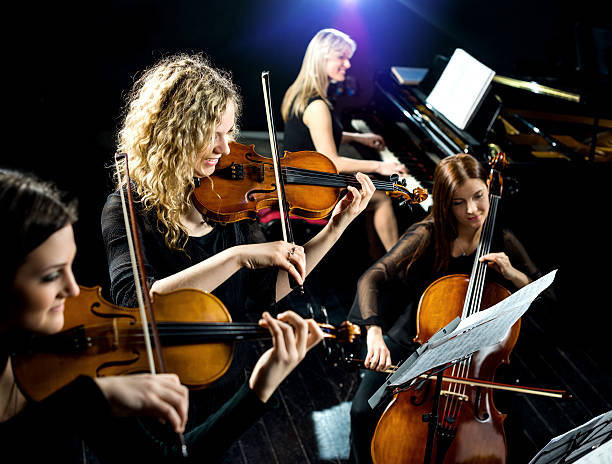 istock Smiling female quartet at rehearsal. 488108934