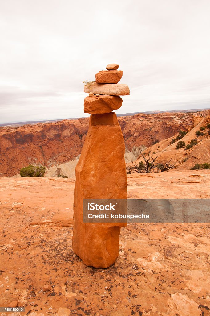 Rock cairn Rock cairn marking a trail near Upheaval Dome in Canyonlands National Park, Utah. 2015 Stock Photo