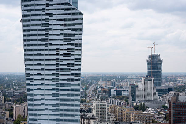 istock Window washers on highrise in Warsaw, Poland 488110182