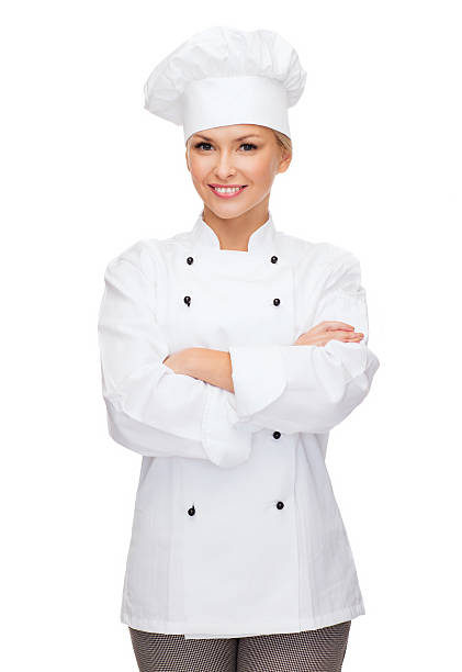 istock smiling female chef with crossed arms 488112254