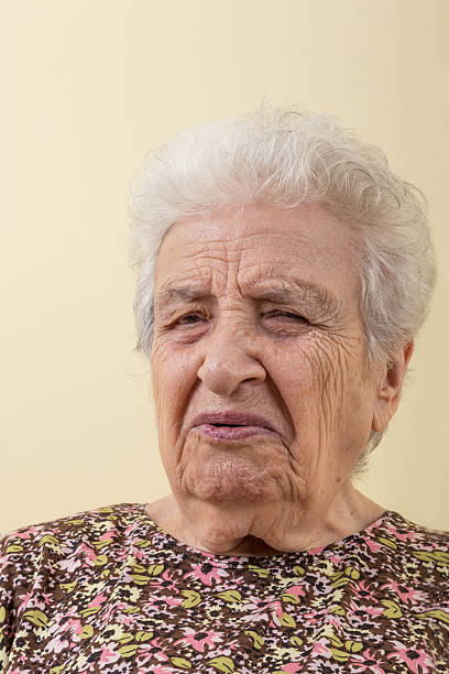 istock sad senior woman 488113460