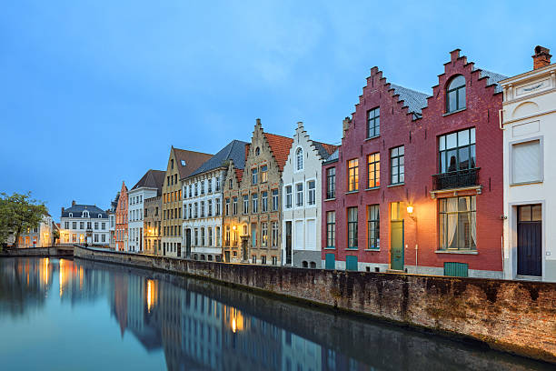 istock Bruges historical pitched roofs and spiers 488114058