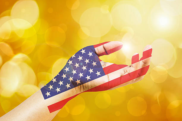 istock American flag in the powers of hand 488114230