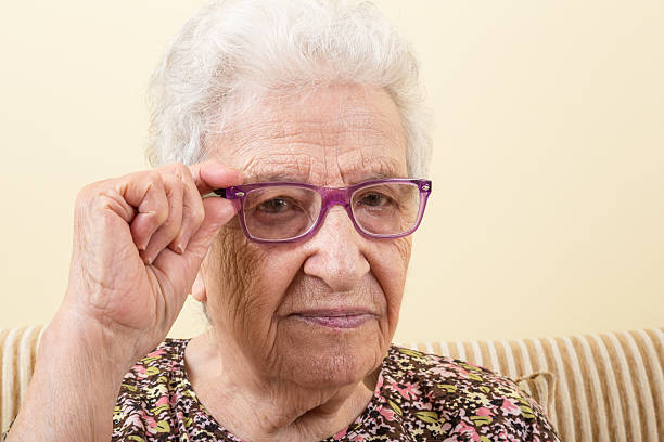 istock senior woman wearing eyeglasses 488114686