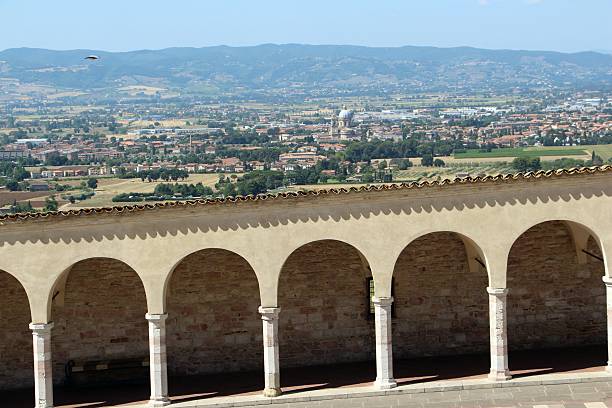 istock assisi - panorama from san francesco's square 488115798