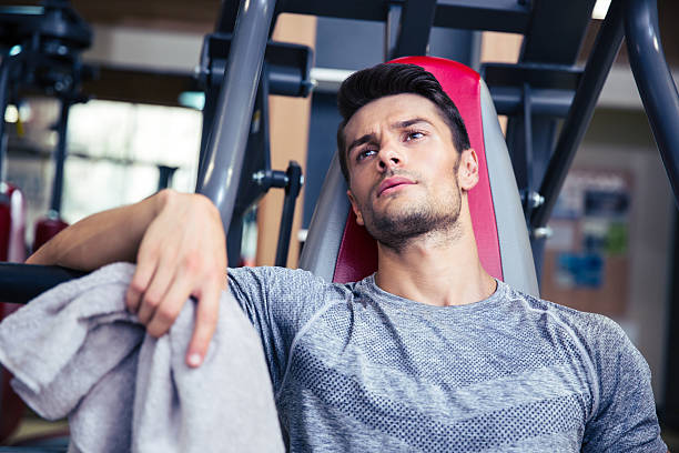 istock Bodybuilder resting at fitness gym 488116214